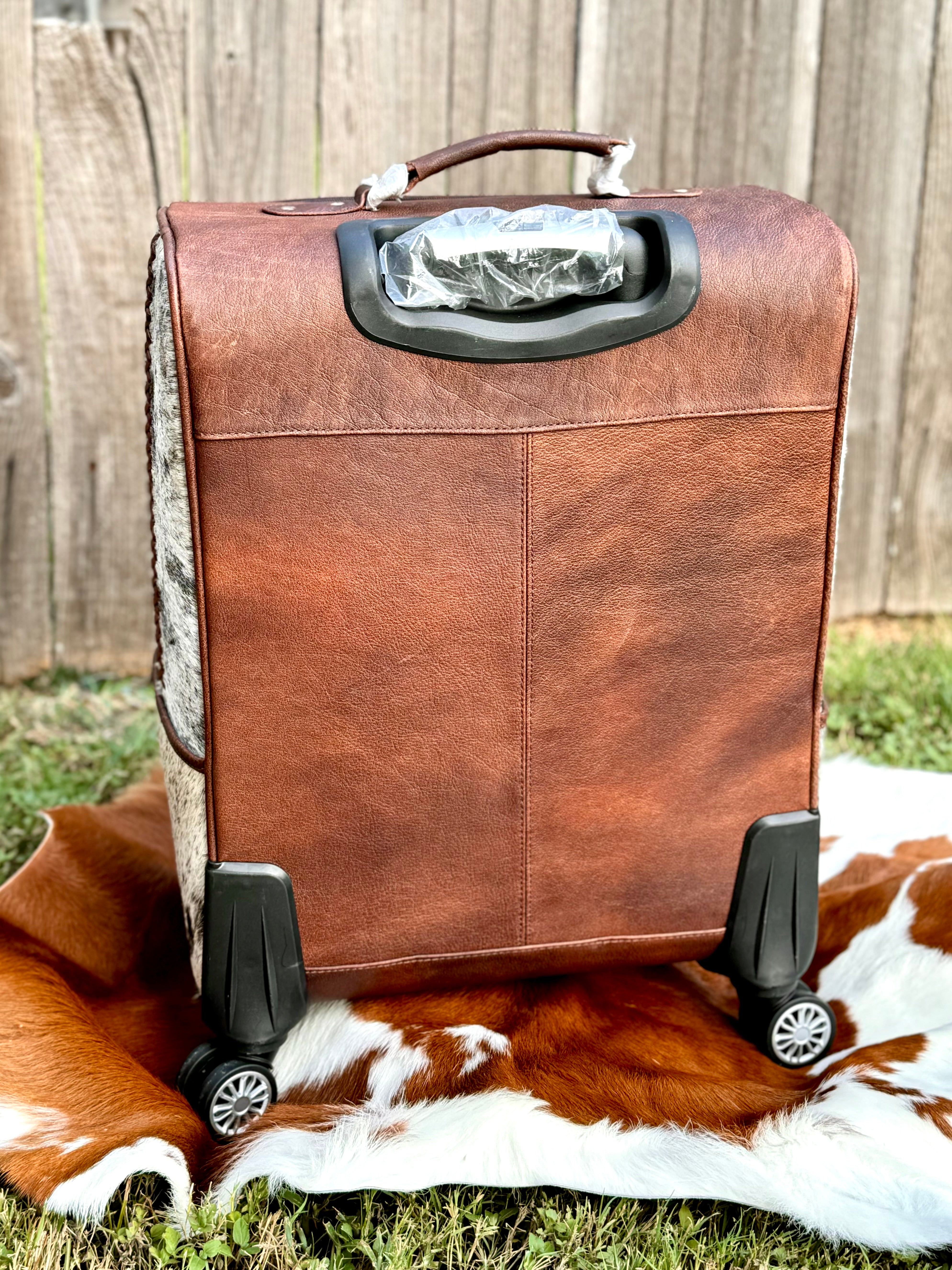 Cowhide luggage online